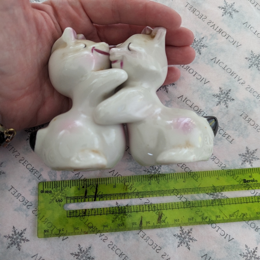 Vintage salt and pepper hugging bunnies